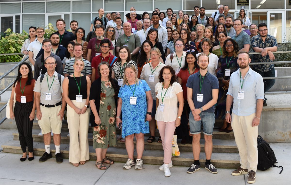 Group photograph of around eighty IMAP 2026 attendees on the steps outside the conference venue in Split, Croatia